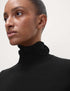 Marks & Spencer "Pure Merino Wool Roll Neck Jumper"